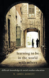 Learning to be in the World with Others
