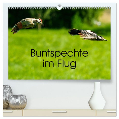 Buntspechte im Flug (hochwertiger Premium Wandkalender 2027 DIN A2 quer), Kunstdruck in Hochglanz
