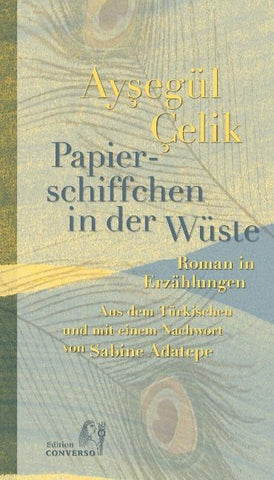 Papierschiffchen in der Wüste